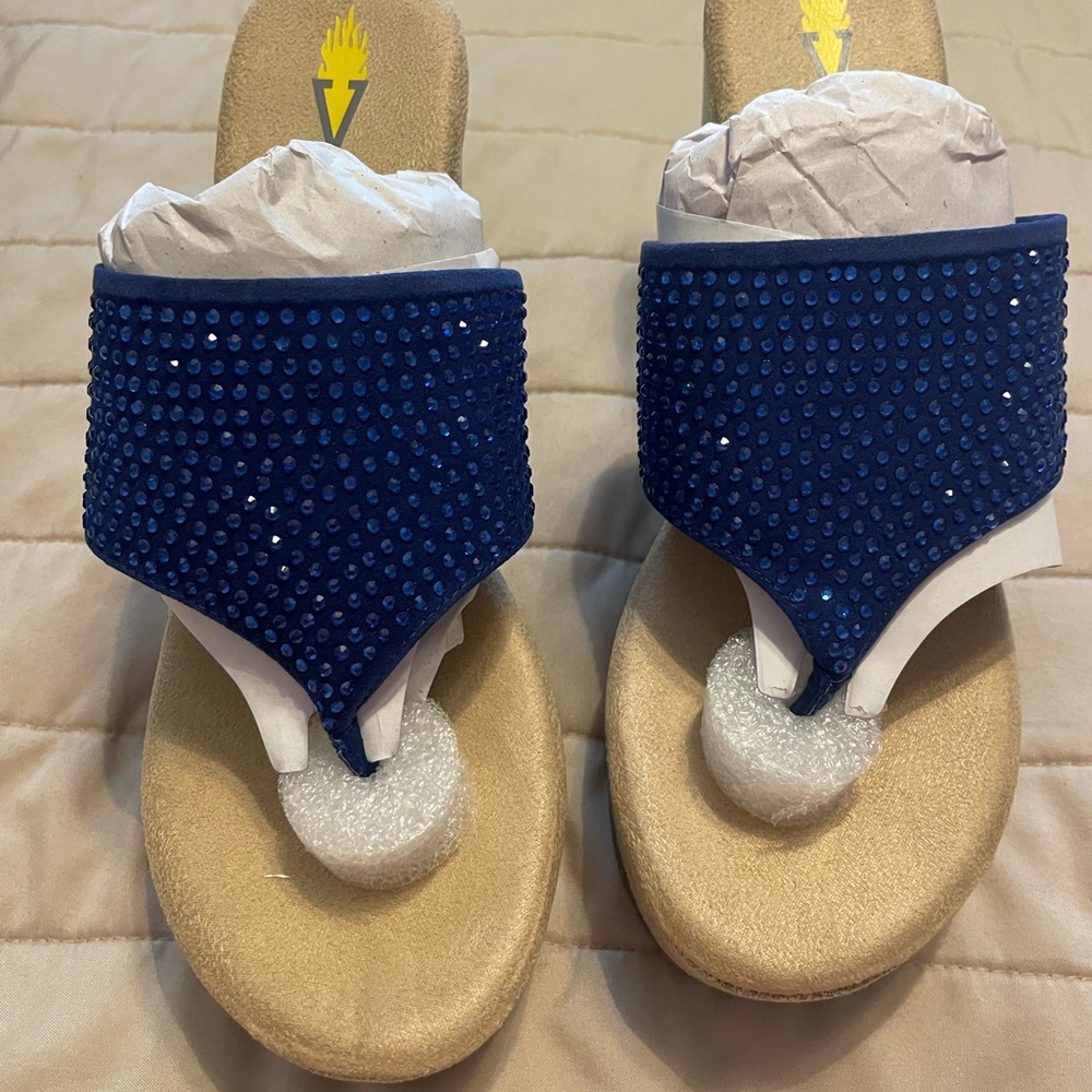 Volatile wedge, blue flip flops. NIB. Size 8.